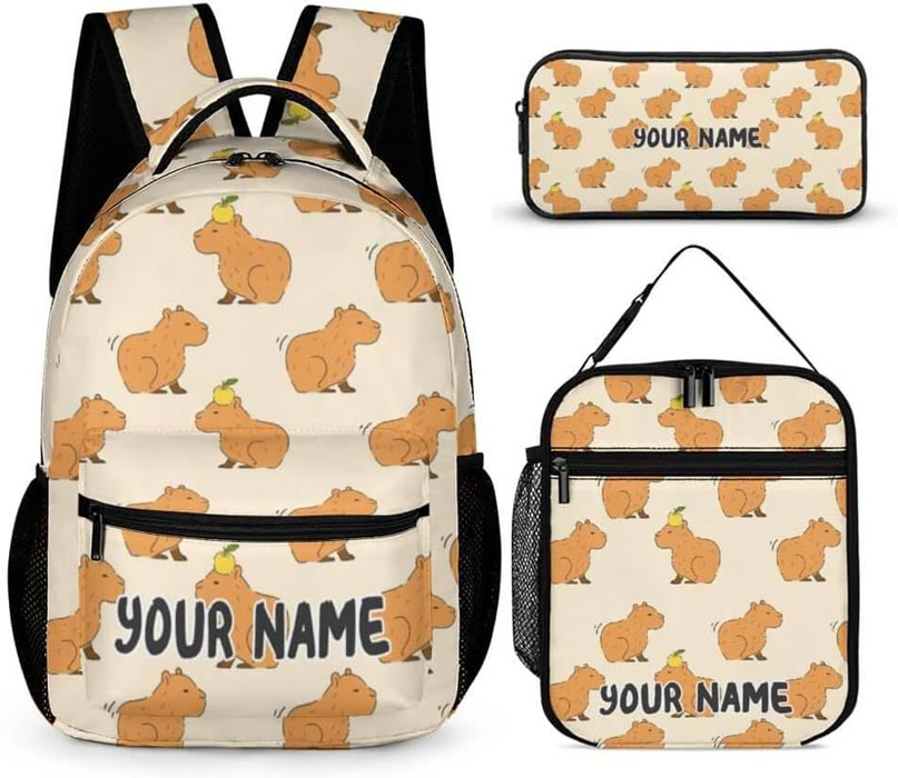 Customizable capybara backpack set with lunch box and pencil case, featuring adorable cartoon capybara design and personalized name option.